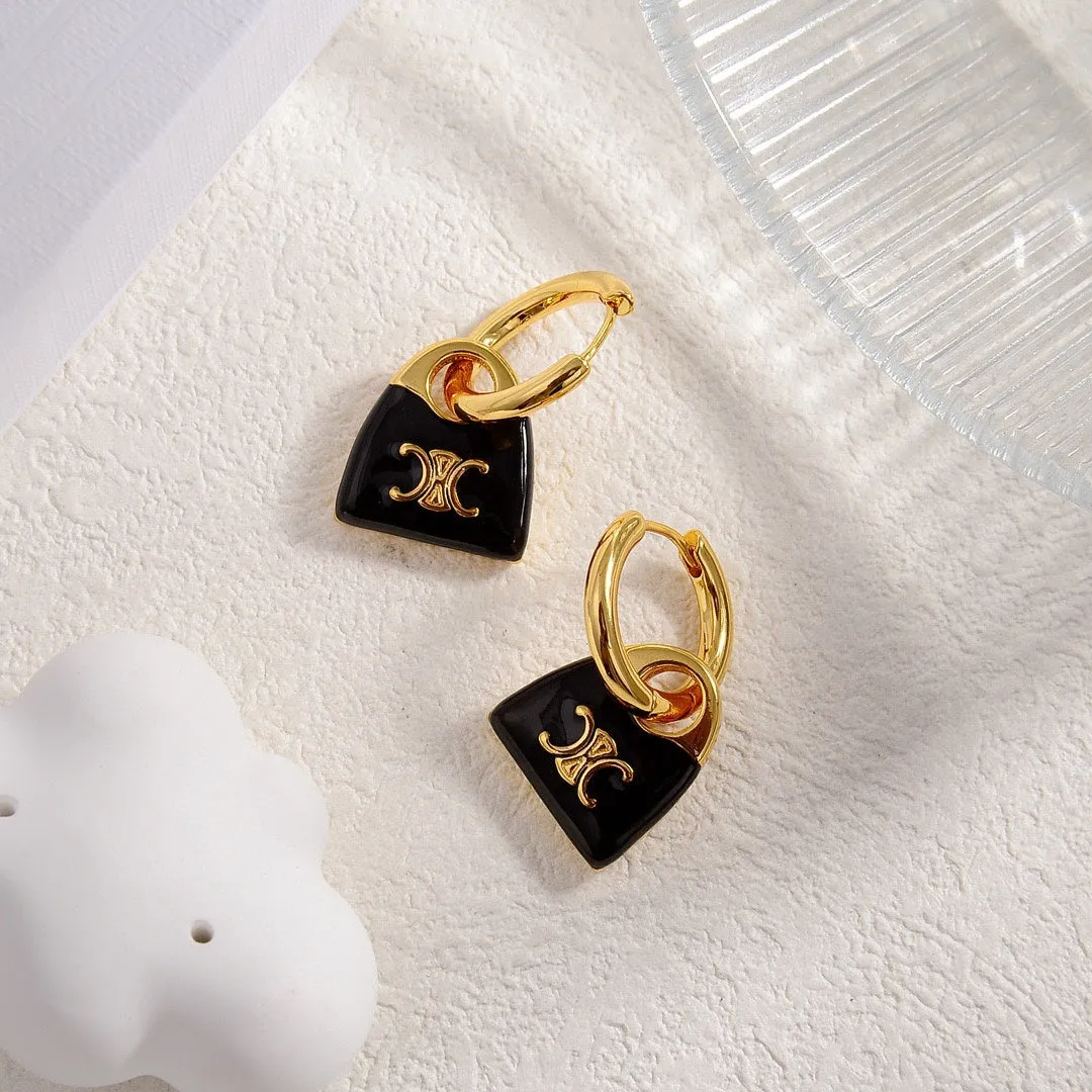 Celine's new black enamel personalized bag with gold earrings EHA101
