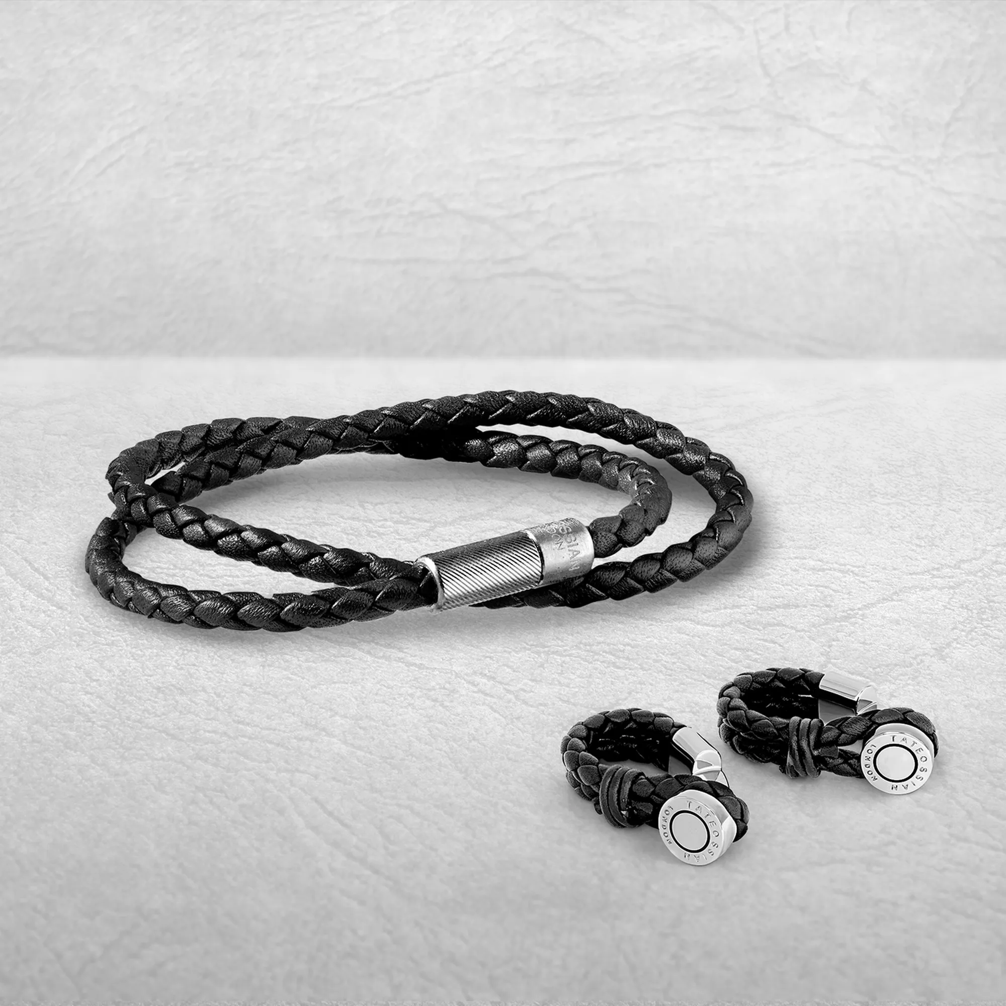 Pelle Wrap Around cufflinks in black leather with rhodium finish