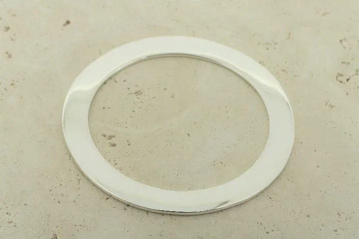 Polished disc bangle