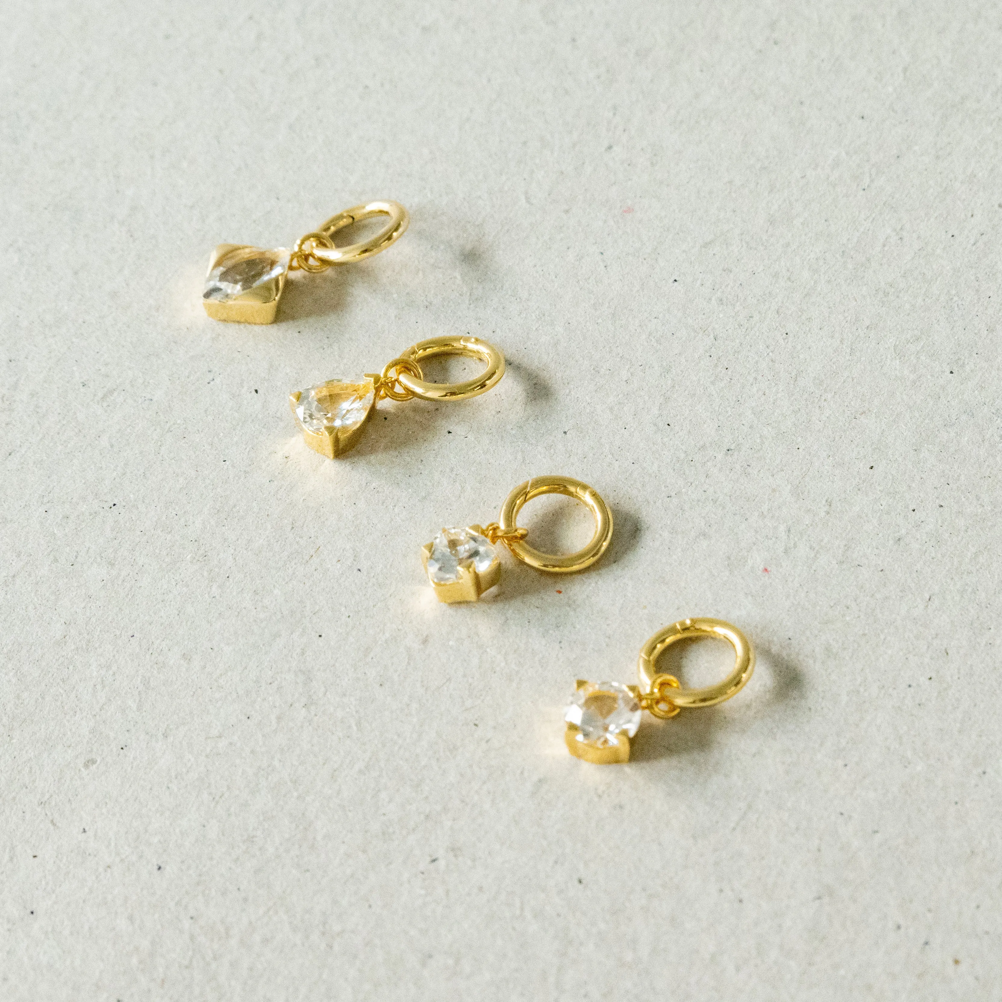 Solitaire charms